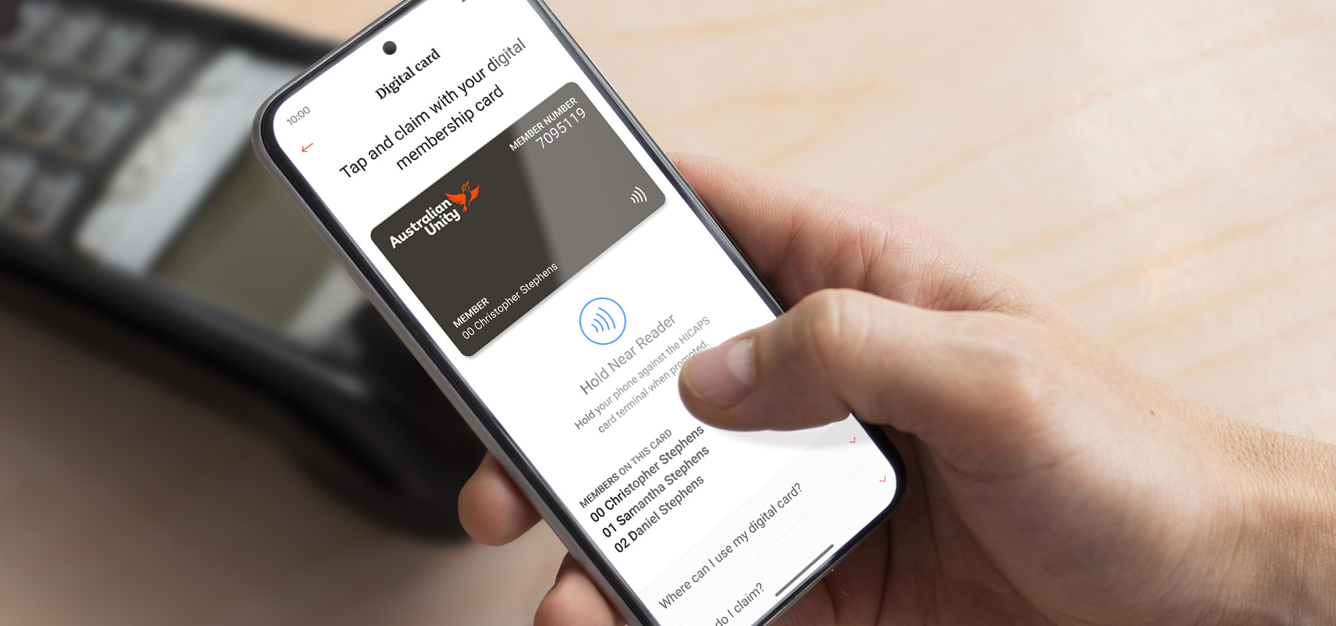 An Australian Unity member tapping their new Digital Card against a HICAPS terminal to make a claim